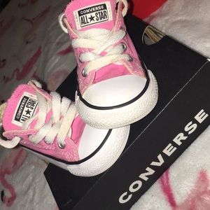 Pink children's Converse.